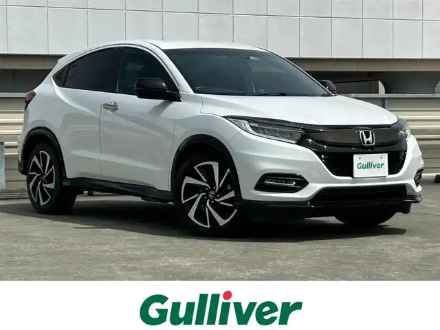ホンダ ヴェゼル RS ホンダセンシング 静岡県 2019(令1)年 6.1万km プラチナホワイトパール ホンダセンシング/寒冷地仕様/ナビ/・フルセグTV/BTオーディオ/SD/USB/HDMI//バックカメラ/ビルトインETC/クルーズコントロール追従有　ACC/ハーフレザーシート/シートヒーターD/N/オートホールドブレーキ/LEDヘッドライト/・LEDフォグ/スマートキー/純正アルミホイール
