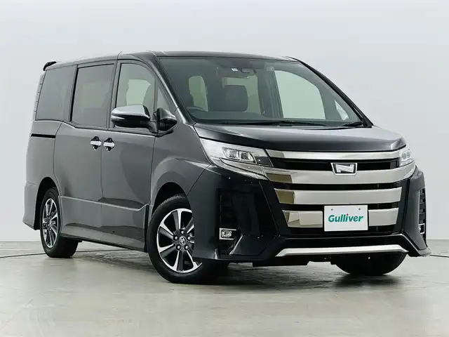 トヨタ ノア Si ダブルバイビーⅢ 福島県 2021(令3)年 1.2万km ブラック トヨタセーフティーセンス　/・PCS/・車線逸脱警報/・オートマチックハイビーム/・コーナーセンサー/純正ＳＤナビゲーション　/【AM/FM/DVD/CD/Bluetooth/フルセグ】/型番:NSZT-Y68T/バックカメラ　/クルーズコントロール　/純正フリップダウンモニター　/ドライブレコーダー　/ハーフレザーシート　/２．０ＥＴＣ　/両側パワースライドドア/プッシュスタート/・スマートキー/・スペアキー/LEDライト/・オートライト/・フォグライト/取扱説明書/・保証書